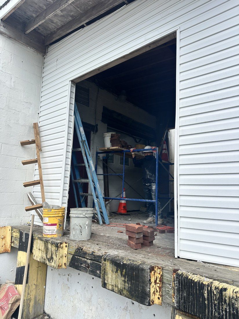 Loading door opening during lintel replacement at an operating Hicksville warehouse