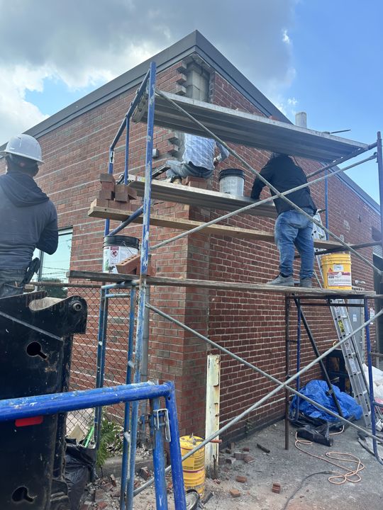 Scaffold access along the elevation during the rebuild.