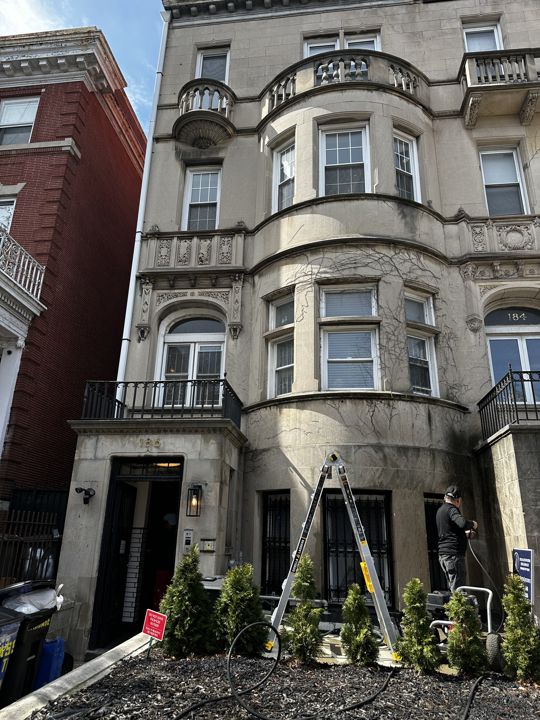 The building front after power washing.