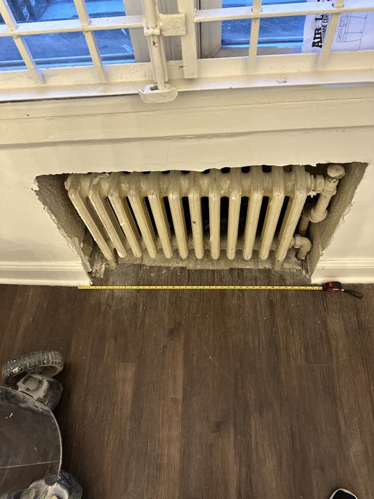 Radiator cover installed.
