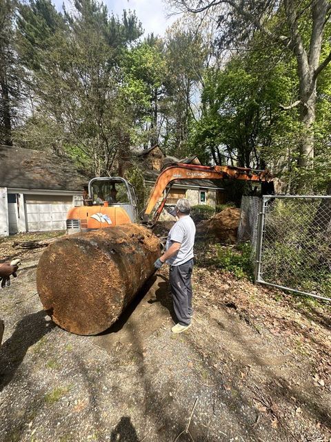 Underground oil tank extracted from the ground and set on grade for inspection